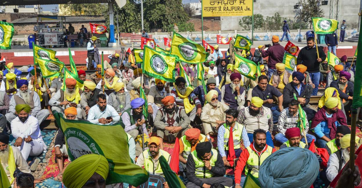 Members of various organisations block railway tracks at Rajpura as they stage 'rail roko' protest in support of farmers agitating at Punjab-Haryana Shambhu border, in Patiala. Photo: PTI